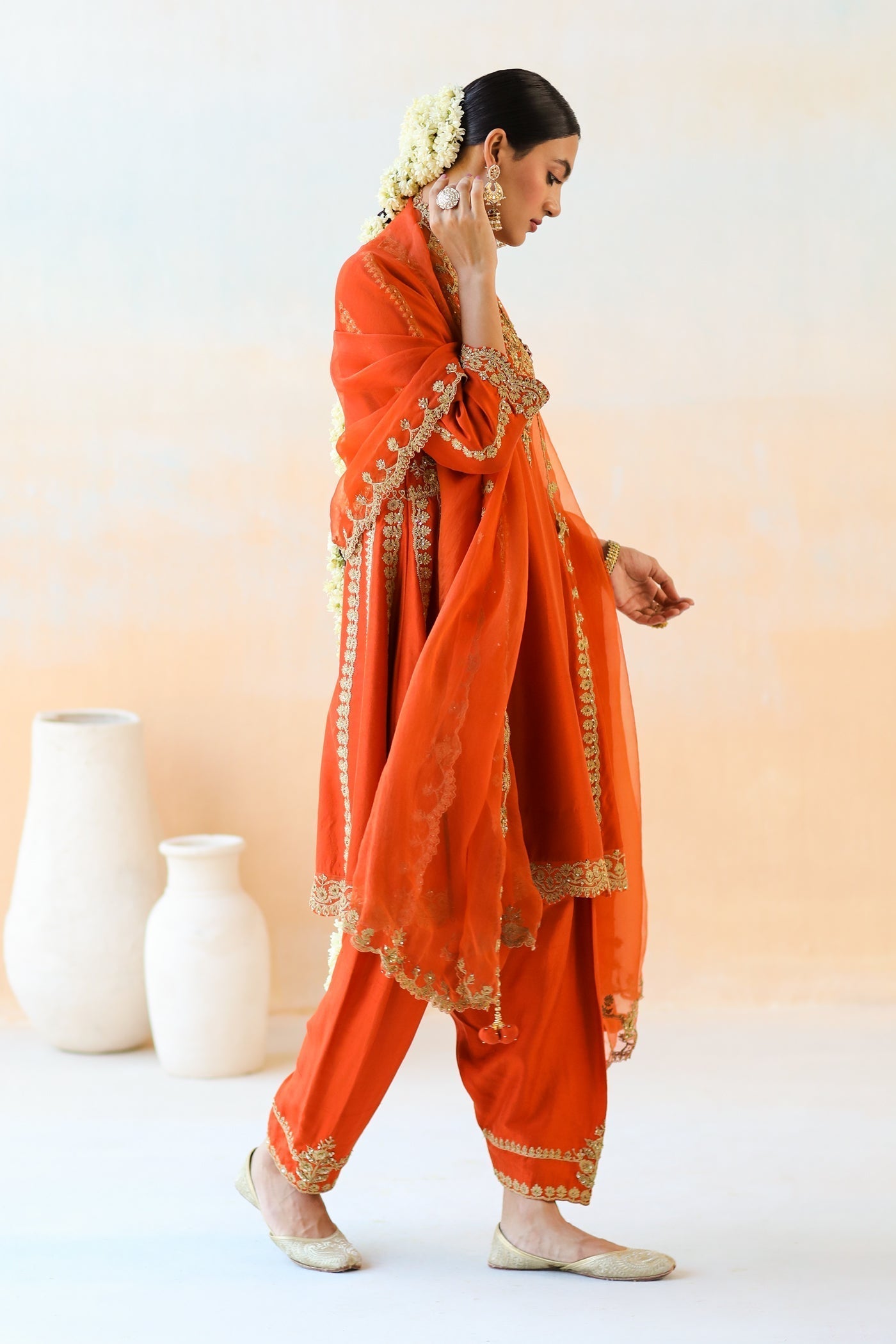 Featuring a Fire Rust Kurta Set with Salwar