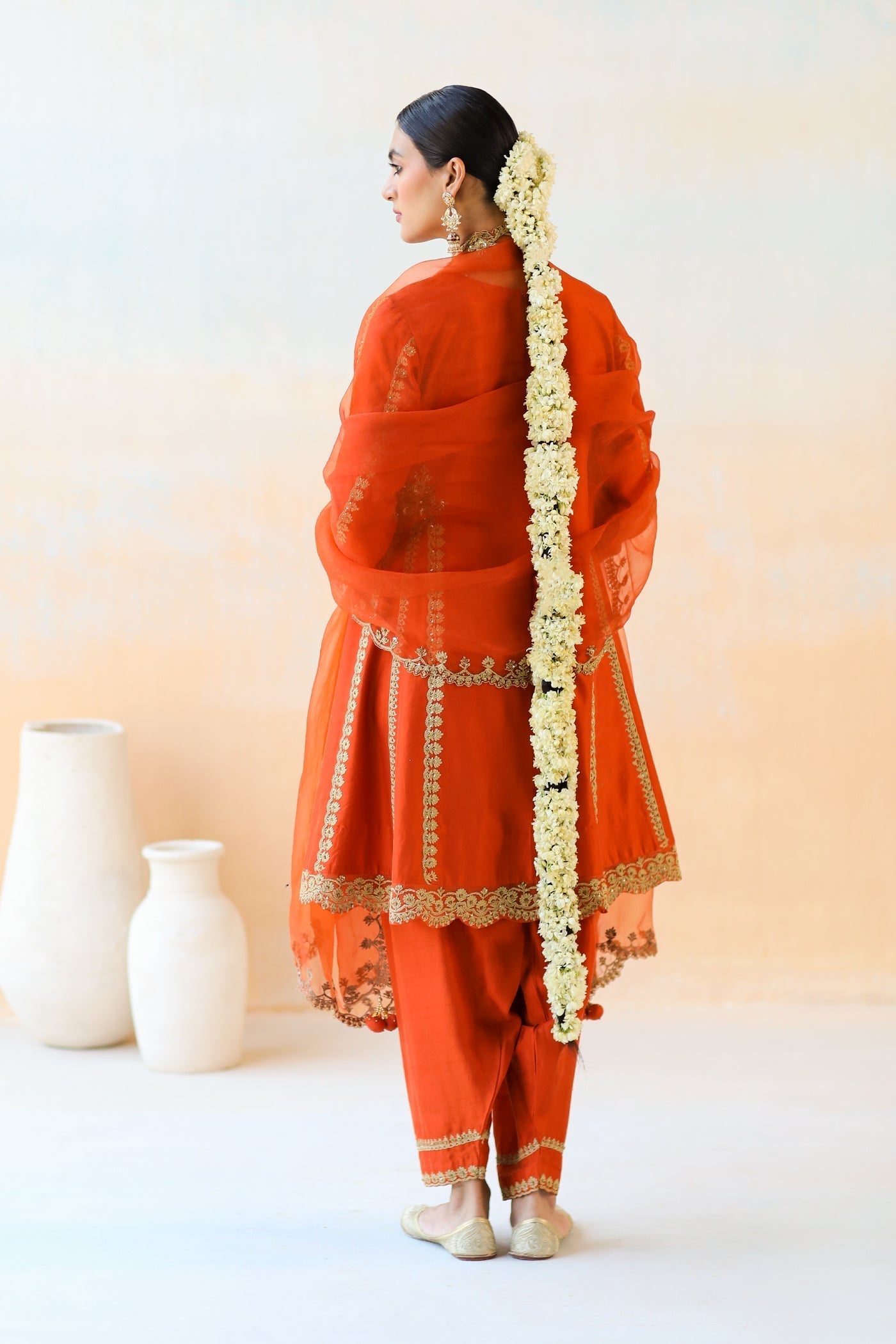 Featuring a Fire Rust Kurta Set with Salwar