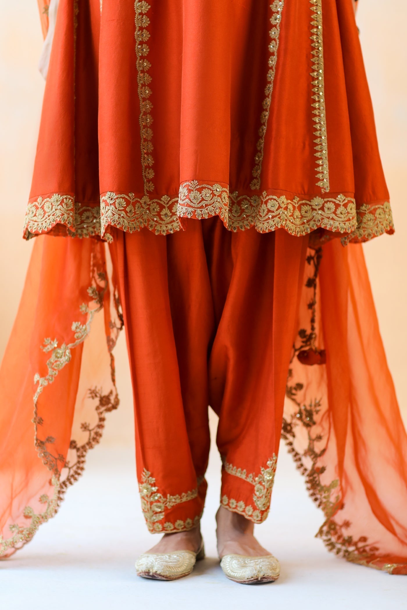 Featuring a Fire Rust Kurta Set with Salwar