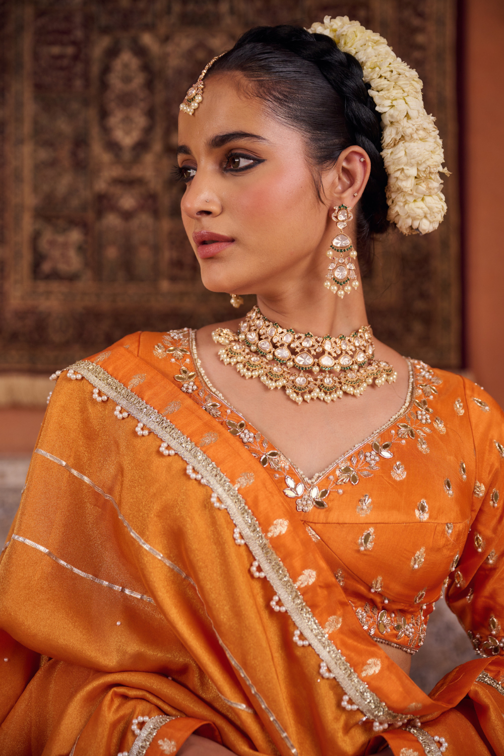 Rust orange silk embroidered blouse, lehenga and dupatta