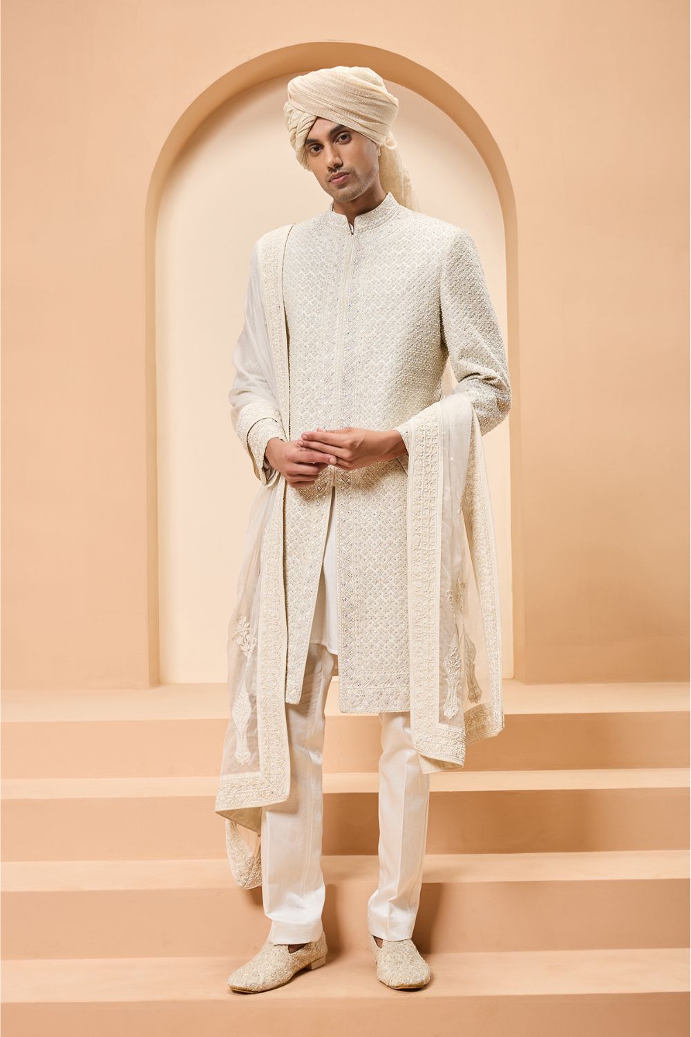 Ivory sherwani detailing with pearl, rainbow sequins and thread work