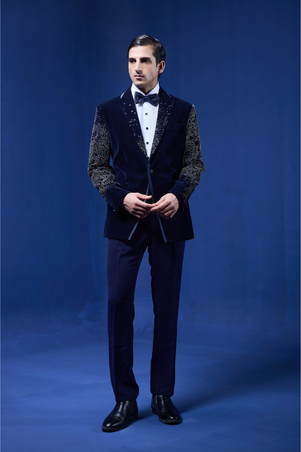 Navy Blue tuxedo highlighted with pearls and sequins