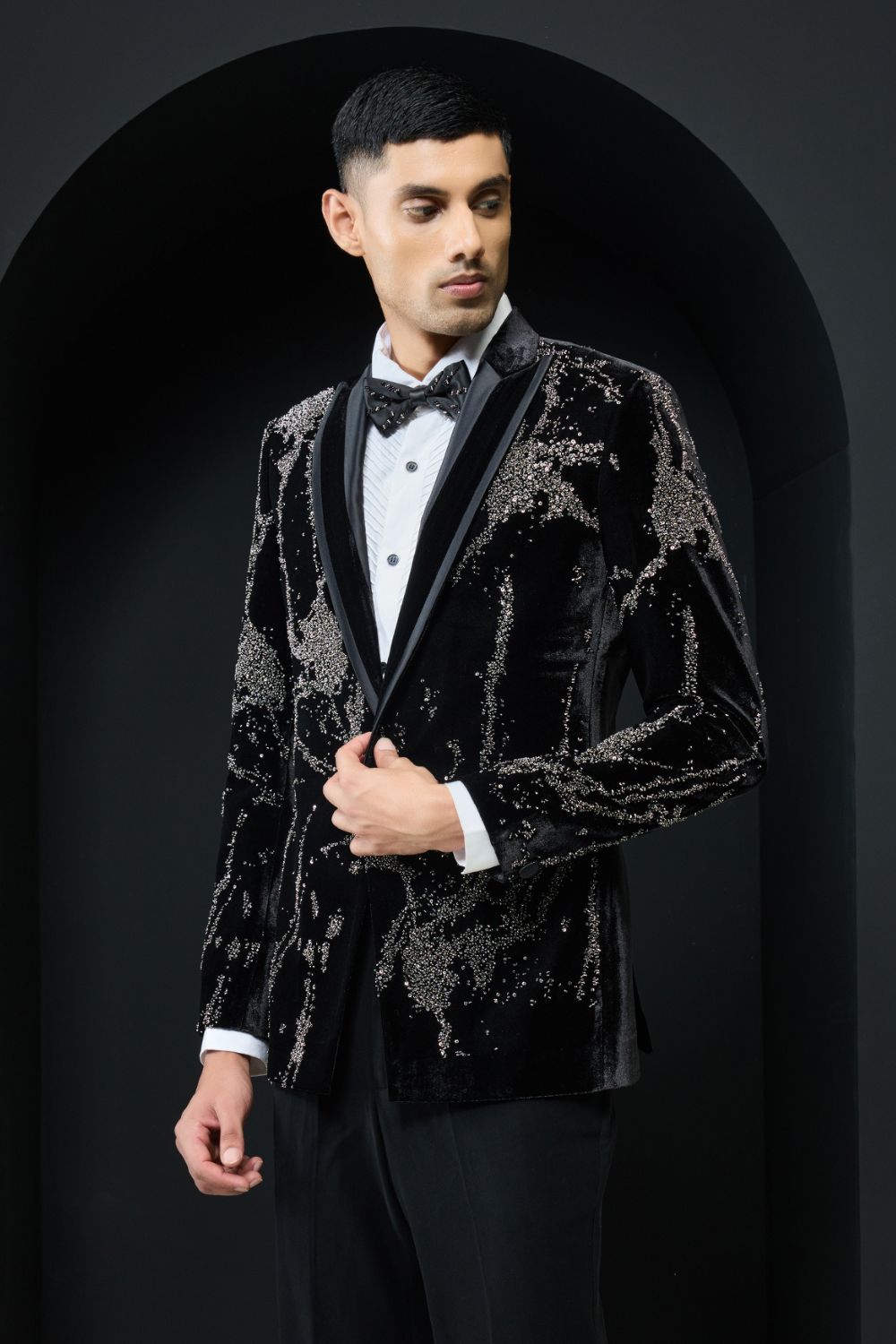 Black tuxedo highlighted with sequins, pearls and cutdana
