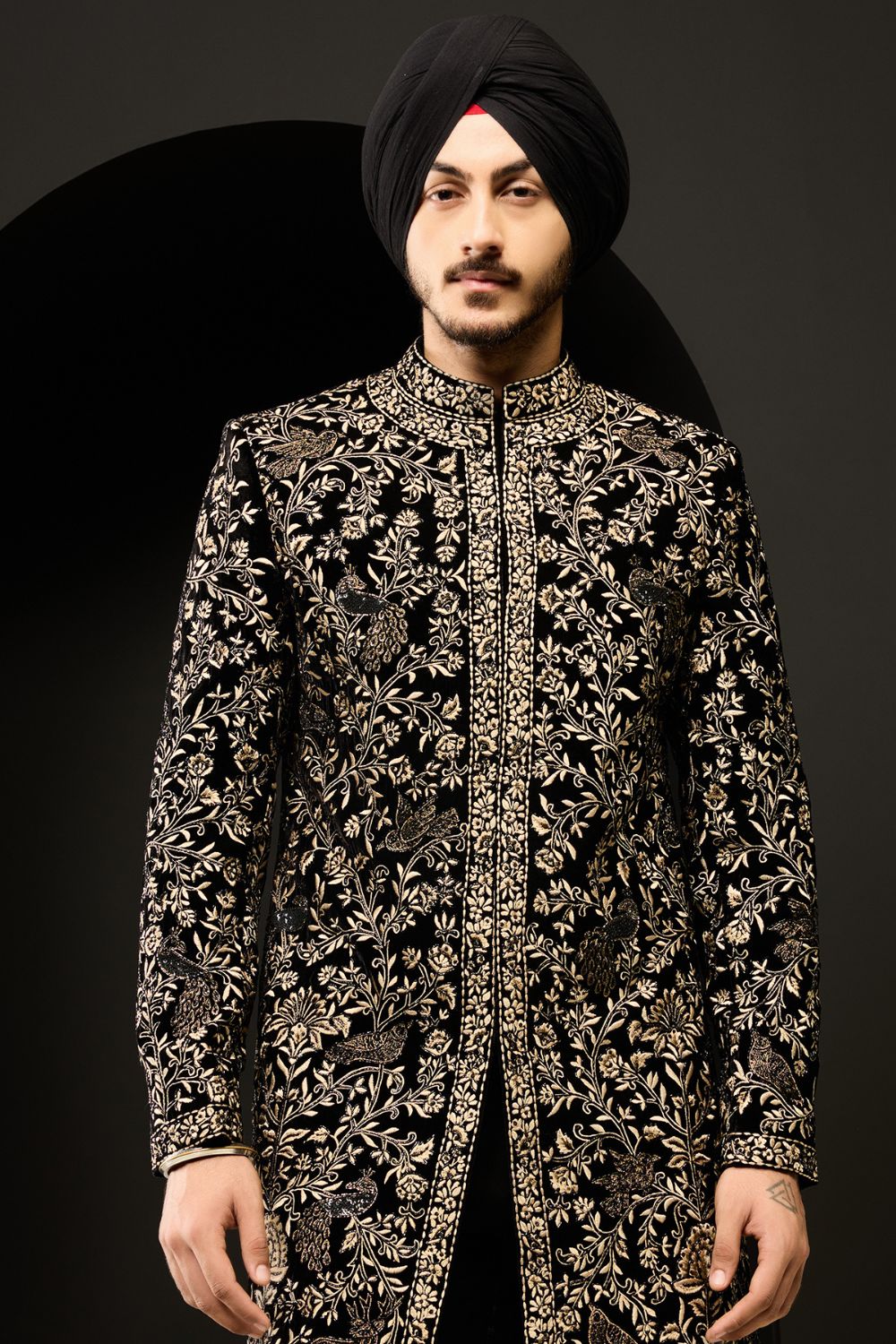 Black indo Western highlighting with gold zari, sequins, pearl and cutdana