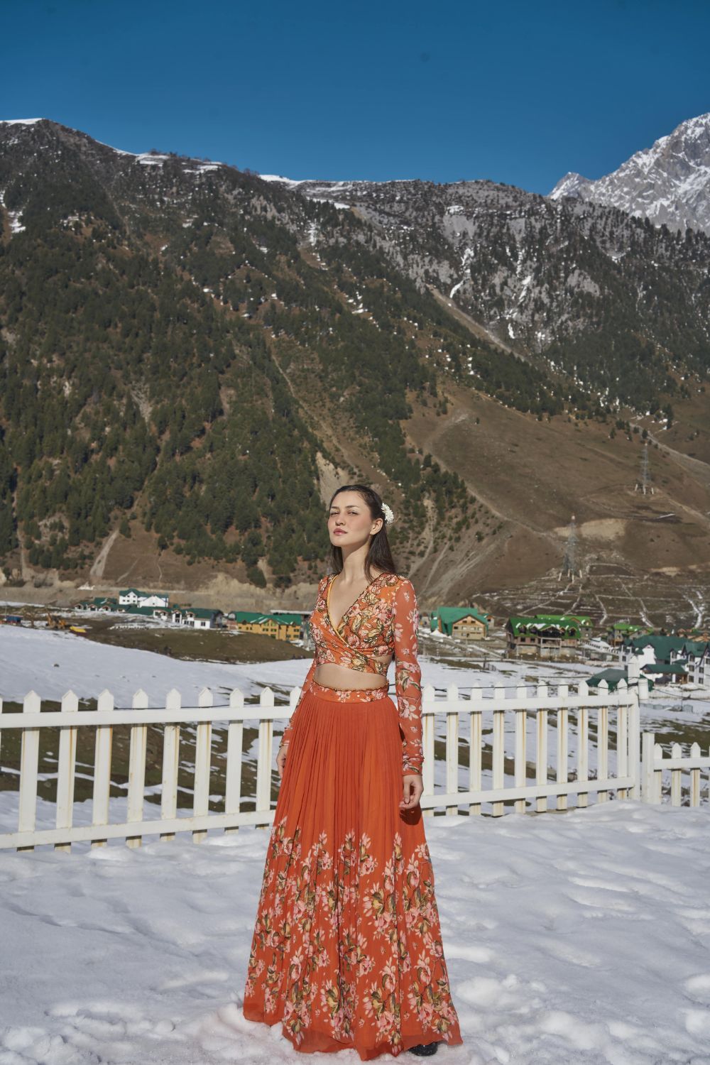 orange floral hand embroidered wrap blouse with pleated lehanga made in georgette fabric