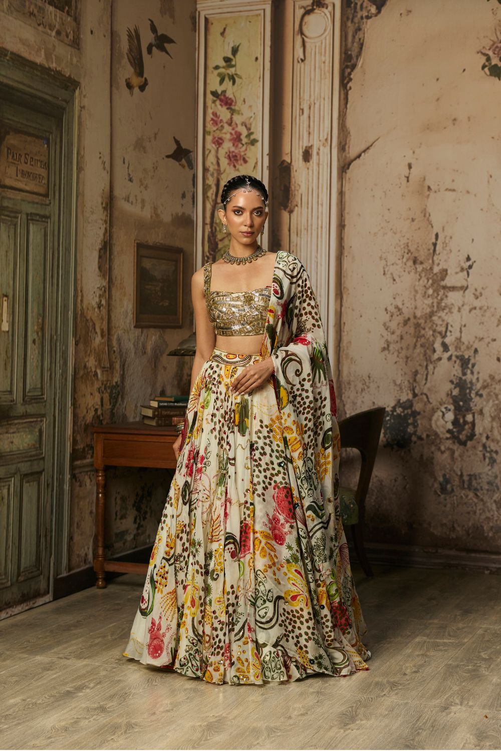 LIGHT GOLD EMBELLISHED BLOUSE AND HIGHLIGHTED LEHENGA SET