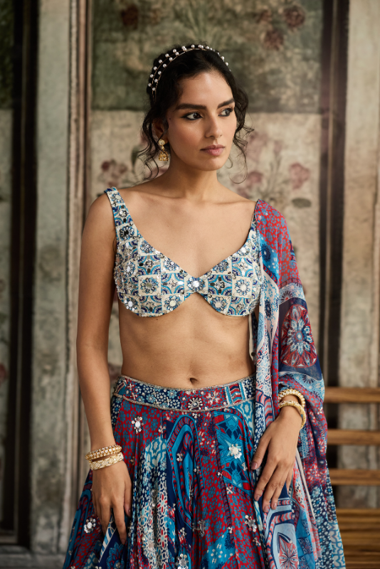 IVORY BUTTA PRINT AND HIGHLIGHTED BLOUSE WITH TEAL PRINT AND HIGHLIGHTED LEHENGA SET