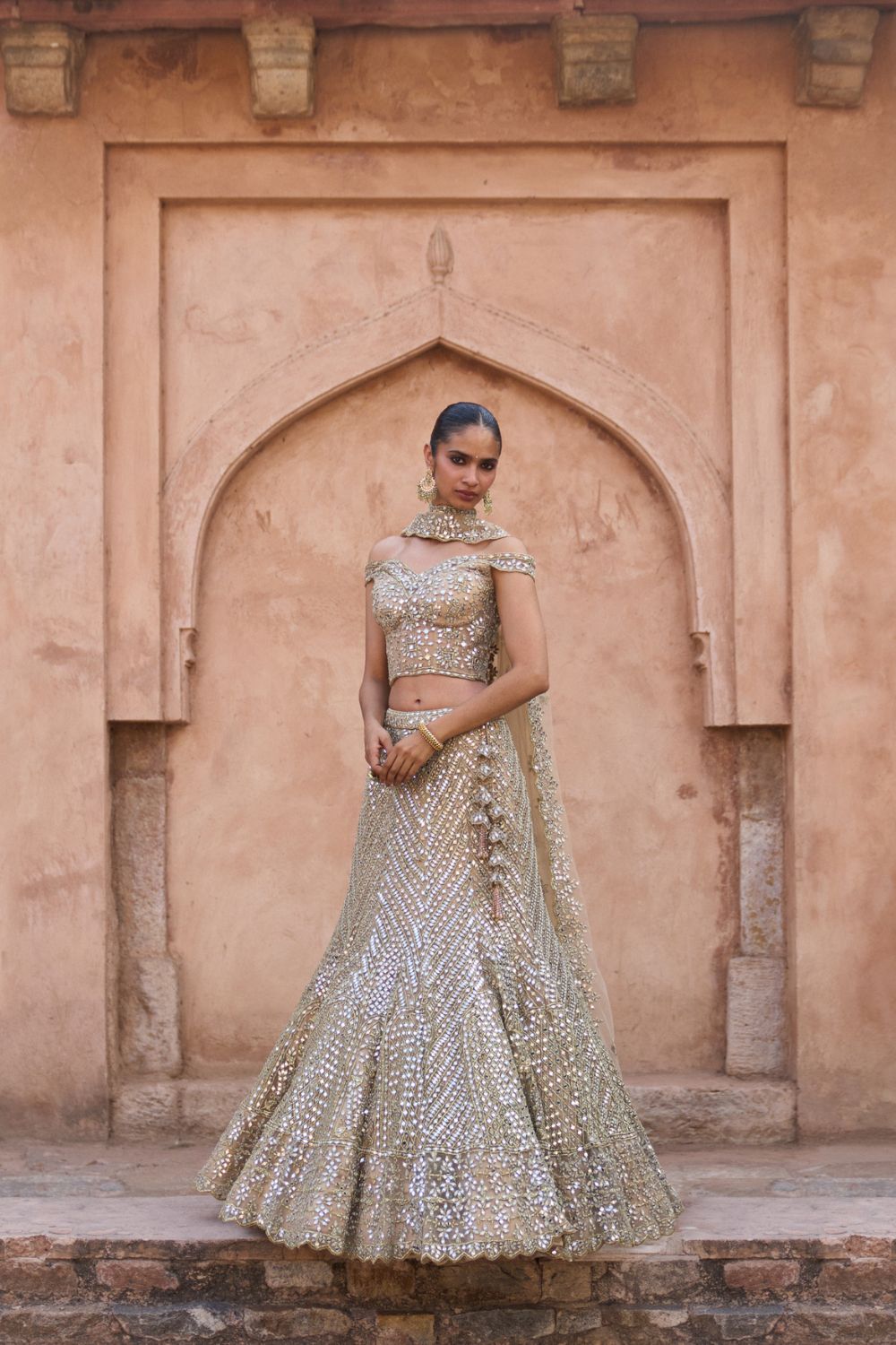 SUNEHRI — Antique Gold Net Lehenga Set