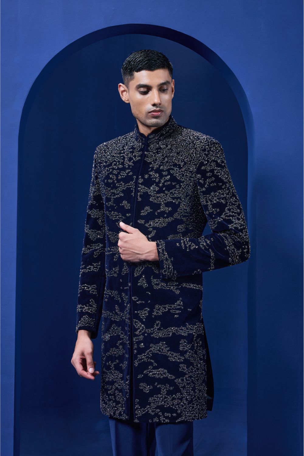 Navy blue Indo Western highlighted with silver zari, sequins,pearl and cutdana