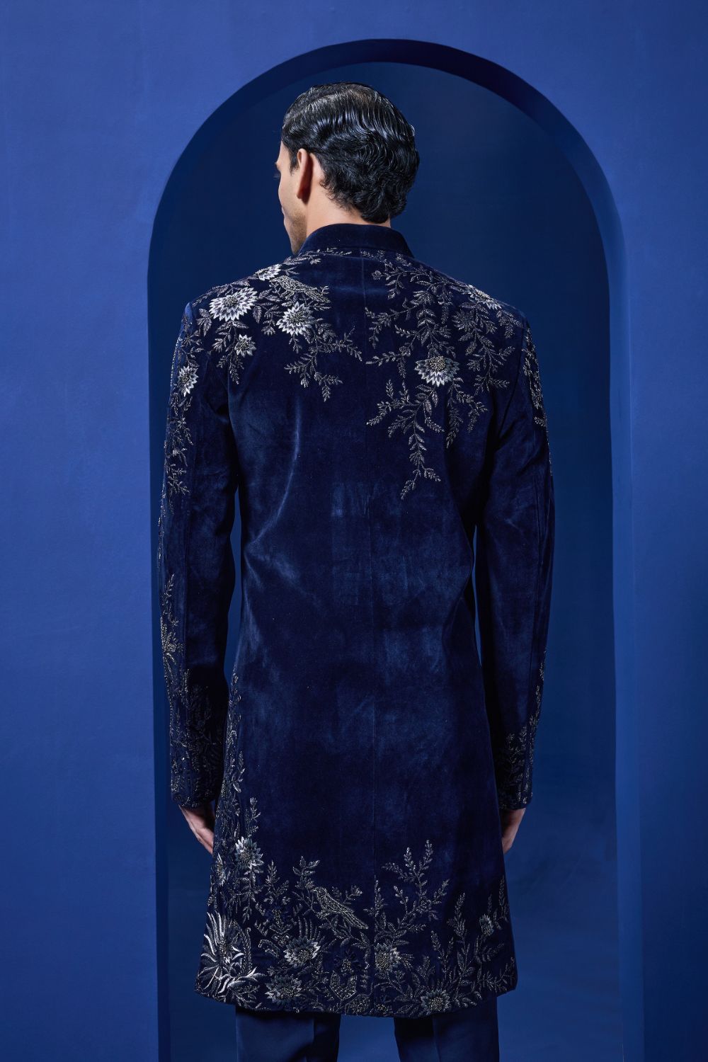 Navy blue Indo Western highlighted with silver zari, pearl and cutdana