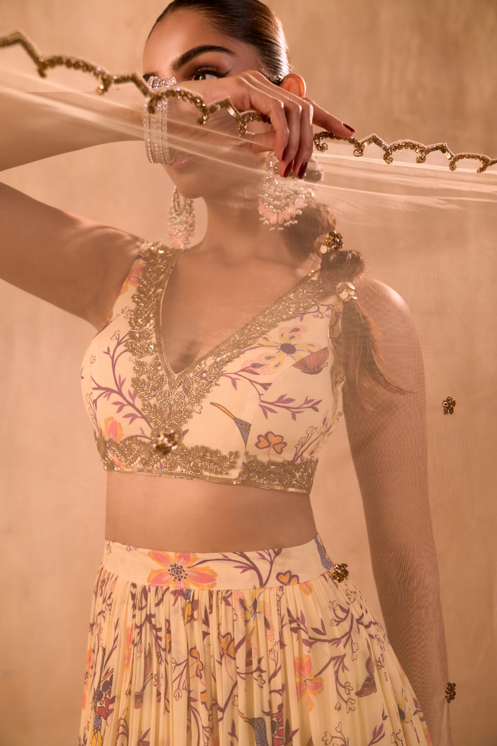 IVORY PRINT EMBROIDERED CHOLI, LAYERED LEHENGA AND DUPATTA SET