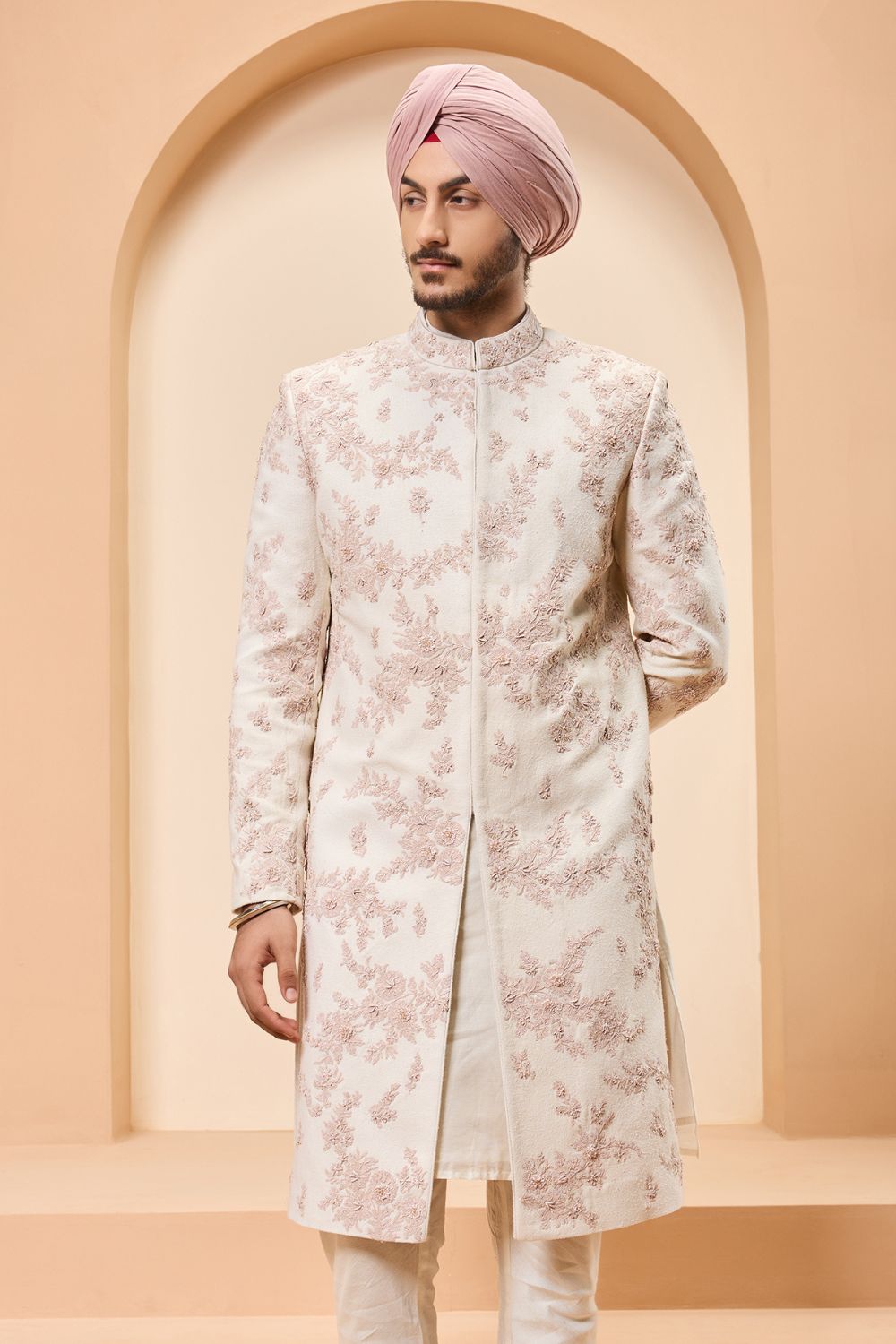 Ivory sherwani detailing with pearl,sequins and thread work