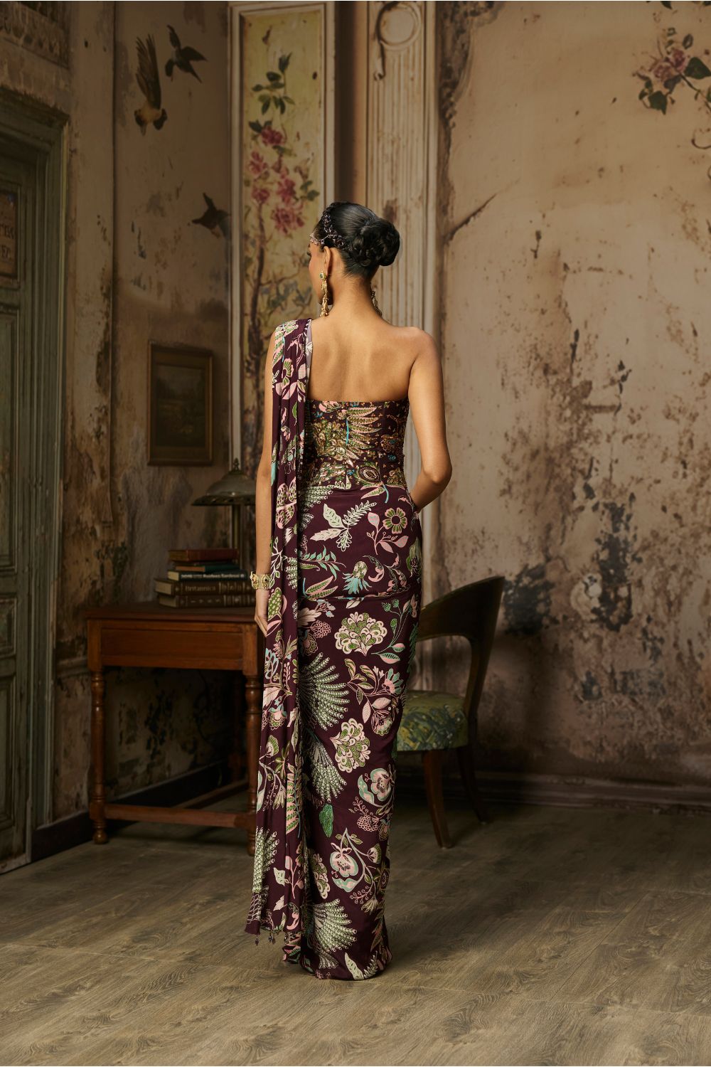 PLUM PRINTED AND HIGHLIGHTED CORSET WITH DHOTI SKIRT SAREE SET