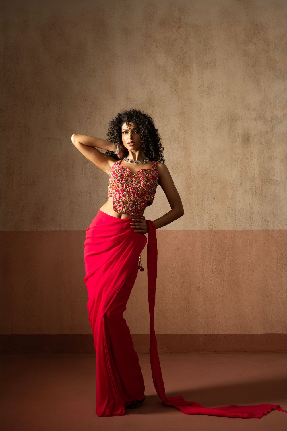 Predraped , fuschia pink , embroidered georgette saree with corset blouse