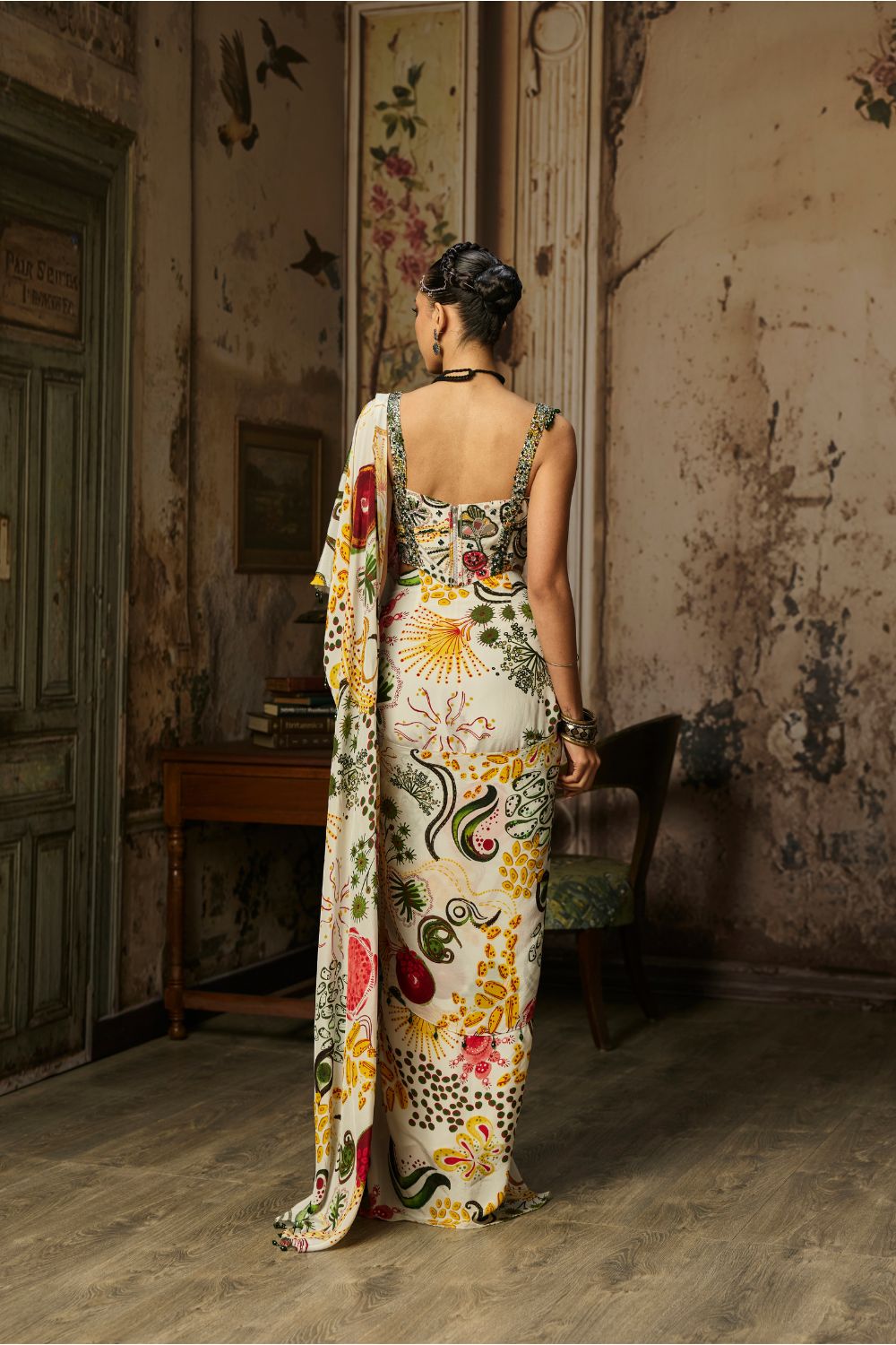 IVORY PRINT AND HIGHLIGHTED CORSET WITH DHOTI SKIRT SAREE SET