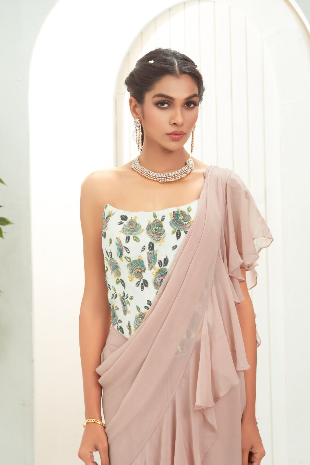 Mauve ruffle saree and hand painted corset set
