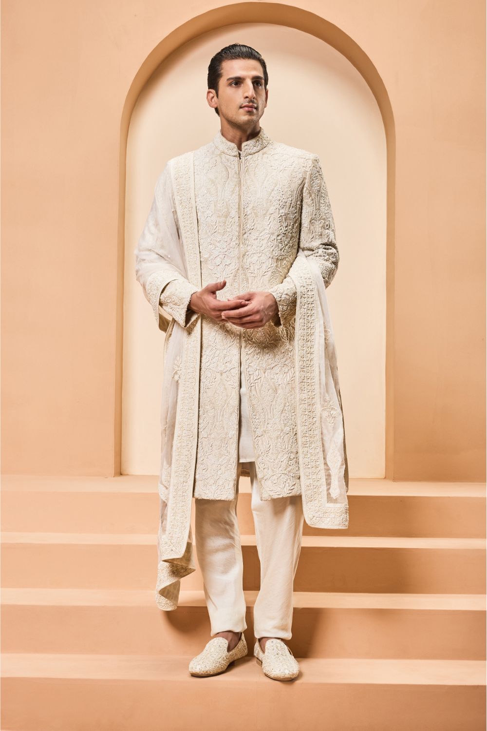 Ivory sherwani detailing with pearl,sequins and aplic work