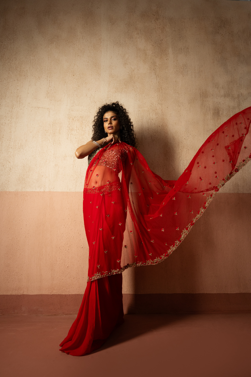 Predraped , red , hand embroidered net & georgette saree with golden blouse