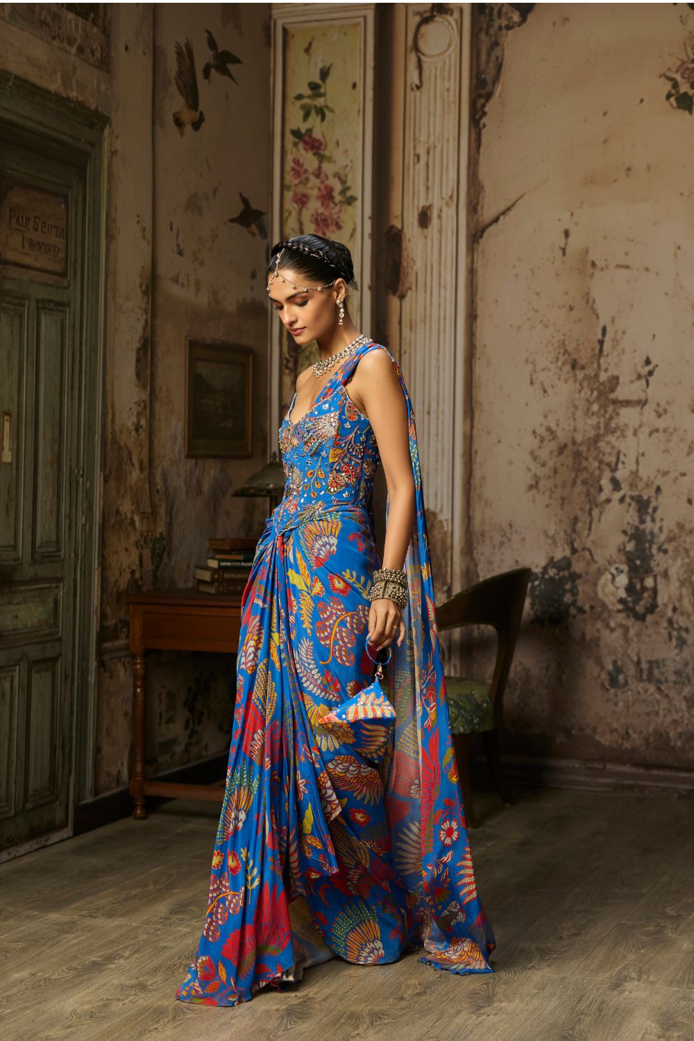 ELECTRIC BLUE PRINTED AND HIGHLIGHTED CORSET DHOTI SKIRT SAREE SET