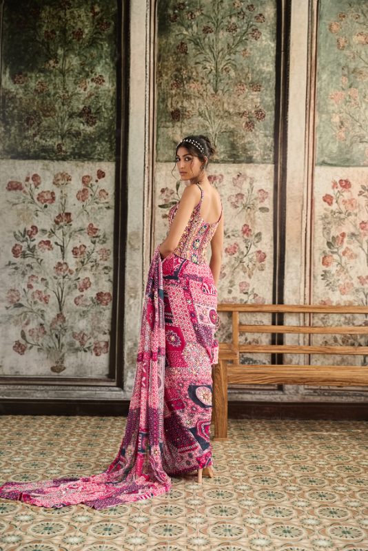 FUSCHIA PRINT AND HIGHLIGHTED CORSET BLOUSE PAIRED WITH PRE-DRAPED CLASSIC SAREE SET