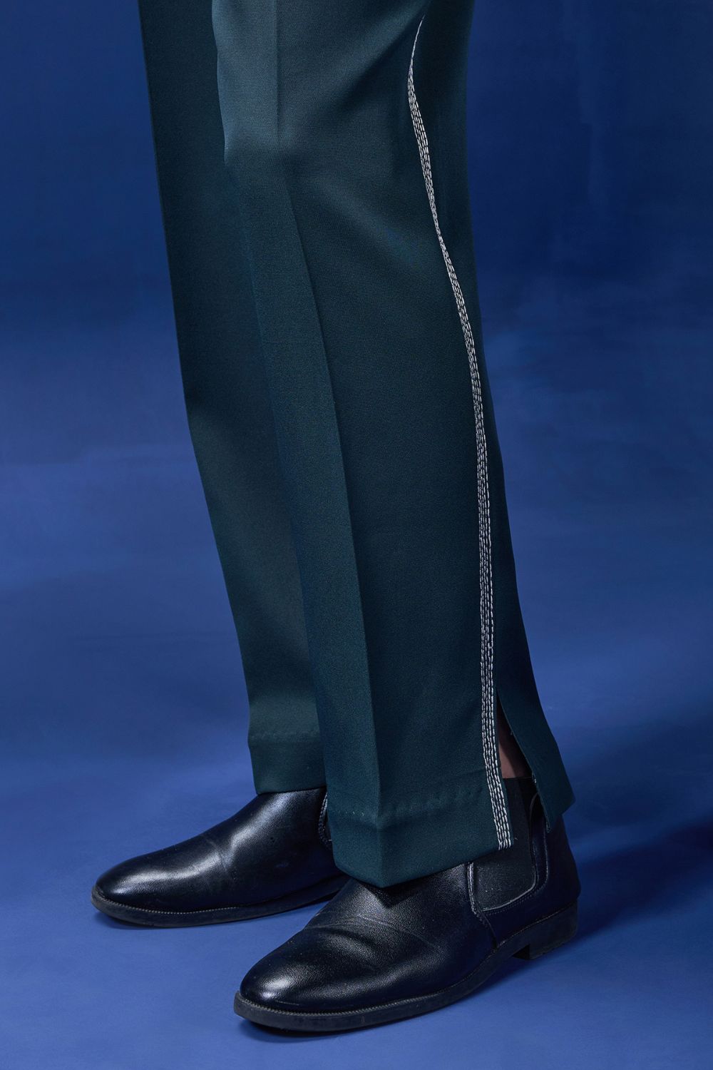 Green blazer detailing with thread work and horse embroidery