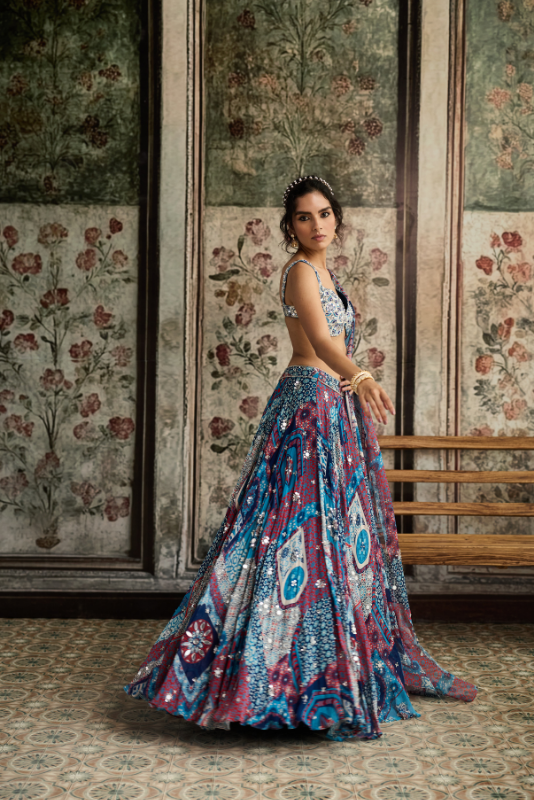 IVORY BUTTA PRINT AND HIGHLIGHTED BLOUSE WITH TEAL PRINT AND HIGHLIGHTED LEHENGA SET