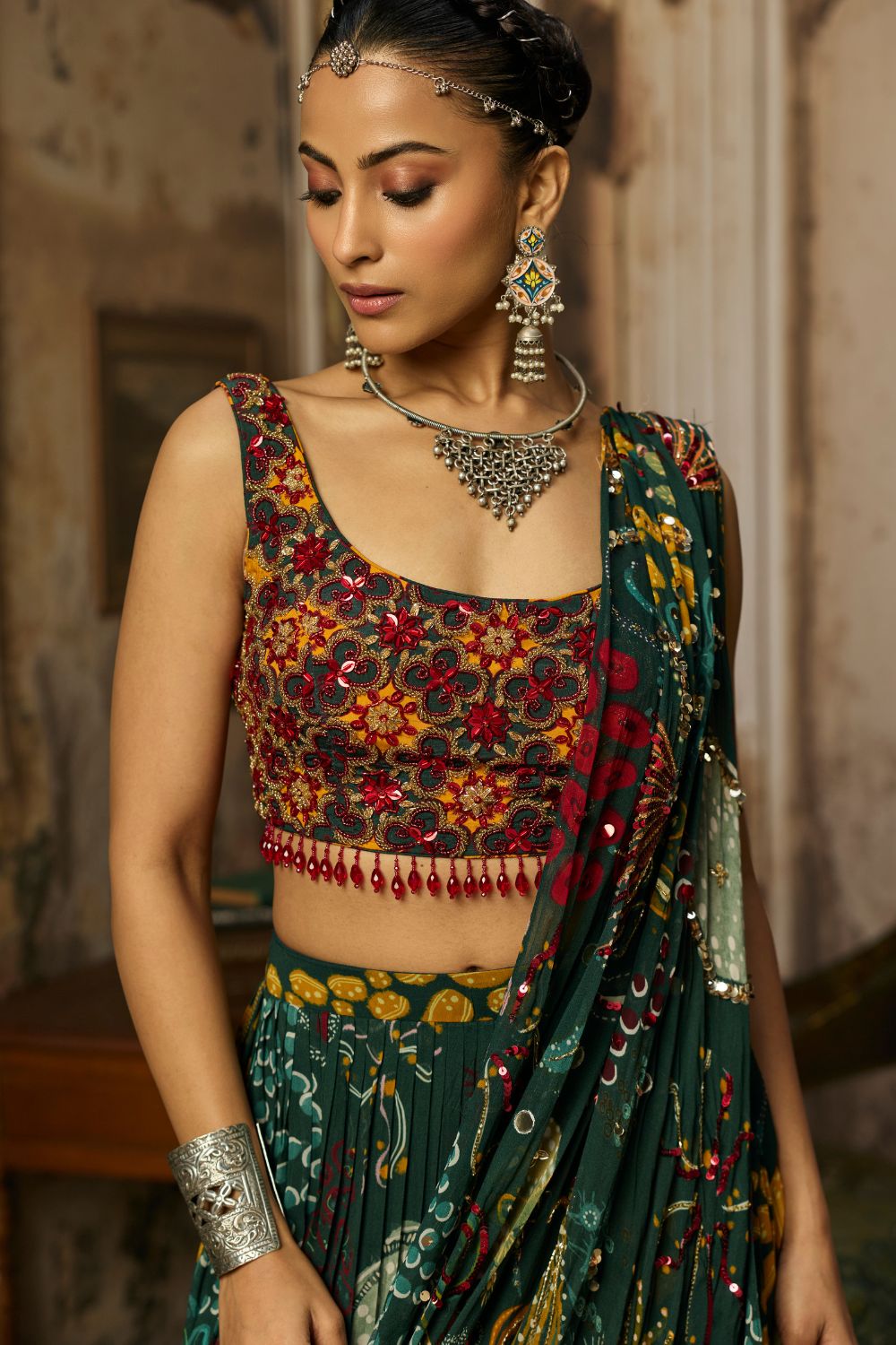 DARK GREEN PRINTED AND HIGHLIGHTED TIERED SKIRT SAREE SET