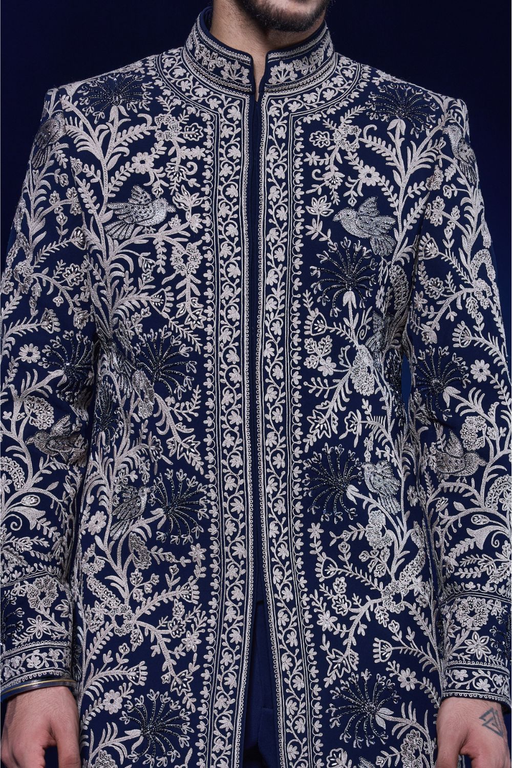 Navy blue Indo Western highlighted with sequins, pearls and thread work