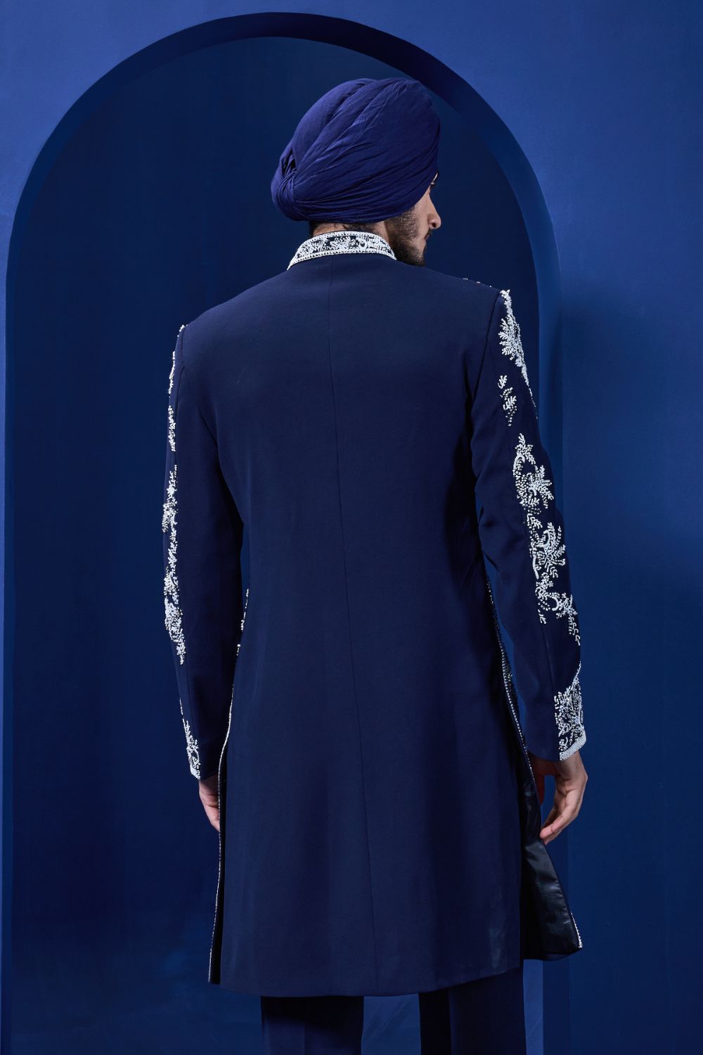 Navy blue Indo Western highlighted with sequins, pearls, cutdana and spring thread work