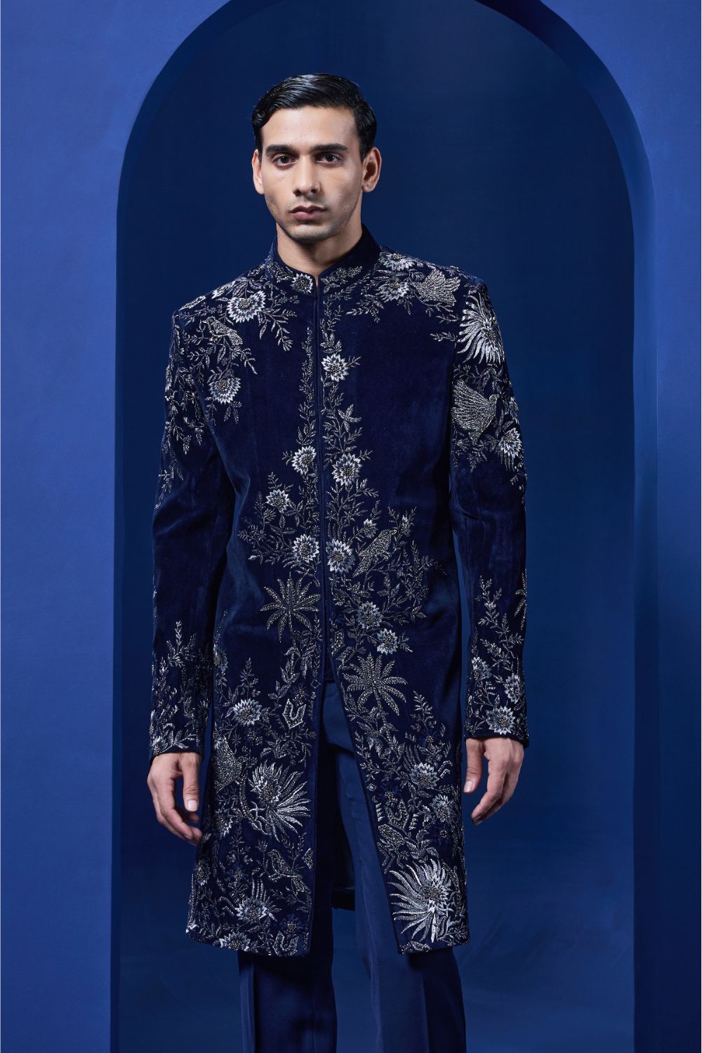 Navy blue Indo Western highlighted with silver zari, pearl and cutdana