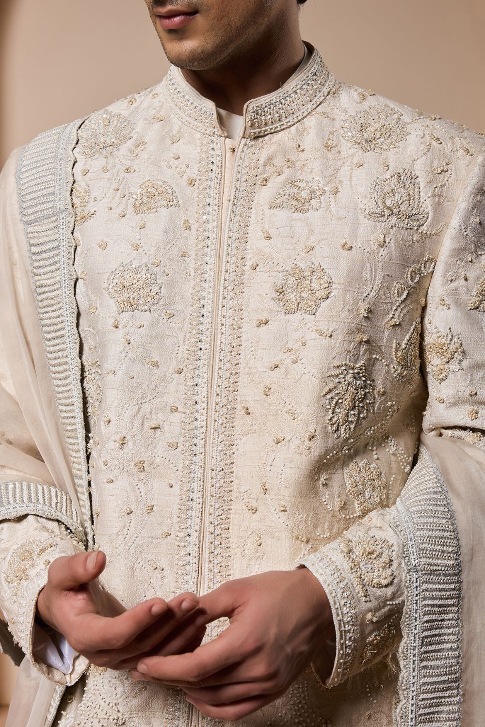 Ivory sherwani detailing with pearl,sequins and thread work