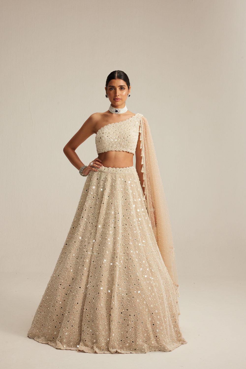 Light Beige Dense mirror and pearl one shoulder lehenga set