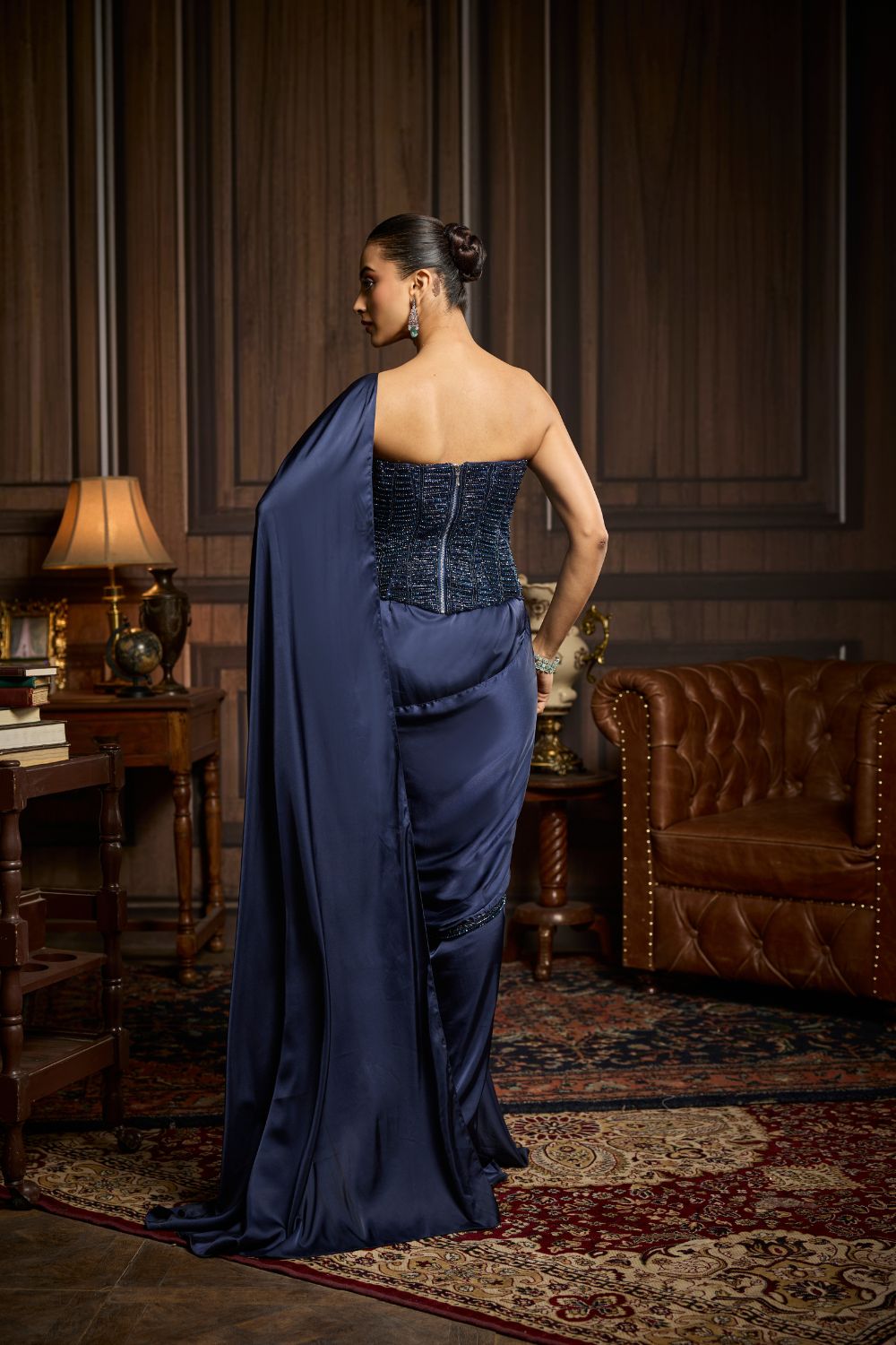 MIDNIGHT BLUE EMBELLISHED CORSET AND SOLID DRAPED DHOTI SAREE SET