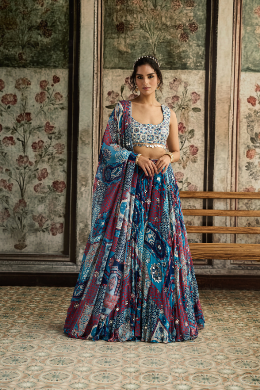 IVORY BUTTA PRINT AND HIGHLIGHTED BLOUSE WITH TEAL PRINT AND HIGHLIGHTED LEHENGA SET