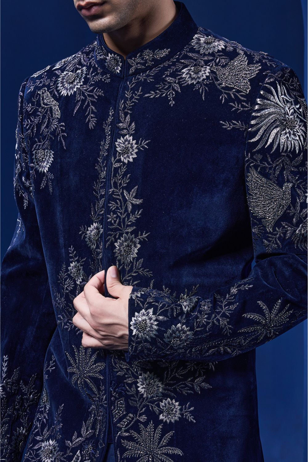 Navy blue Indo Western highlighted with silver zari, pearl and cutdana