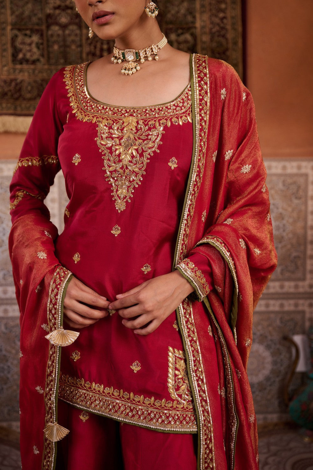 Red upada silk kurti, sharara and shimmer tissue dupatta