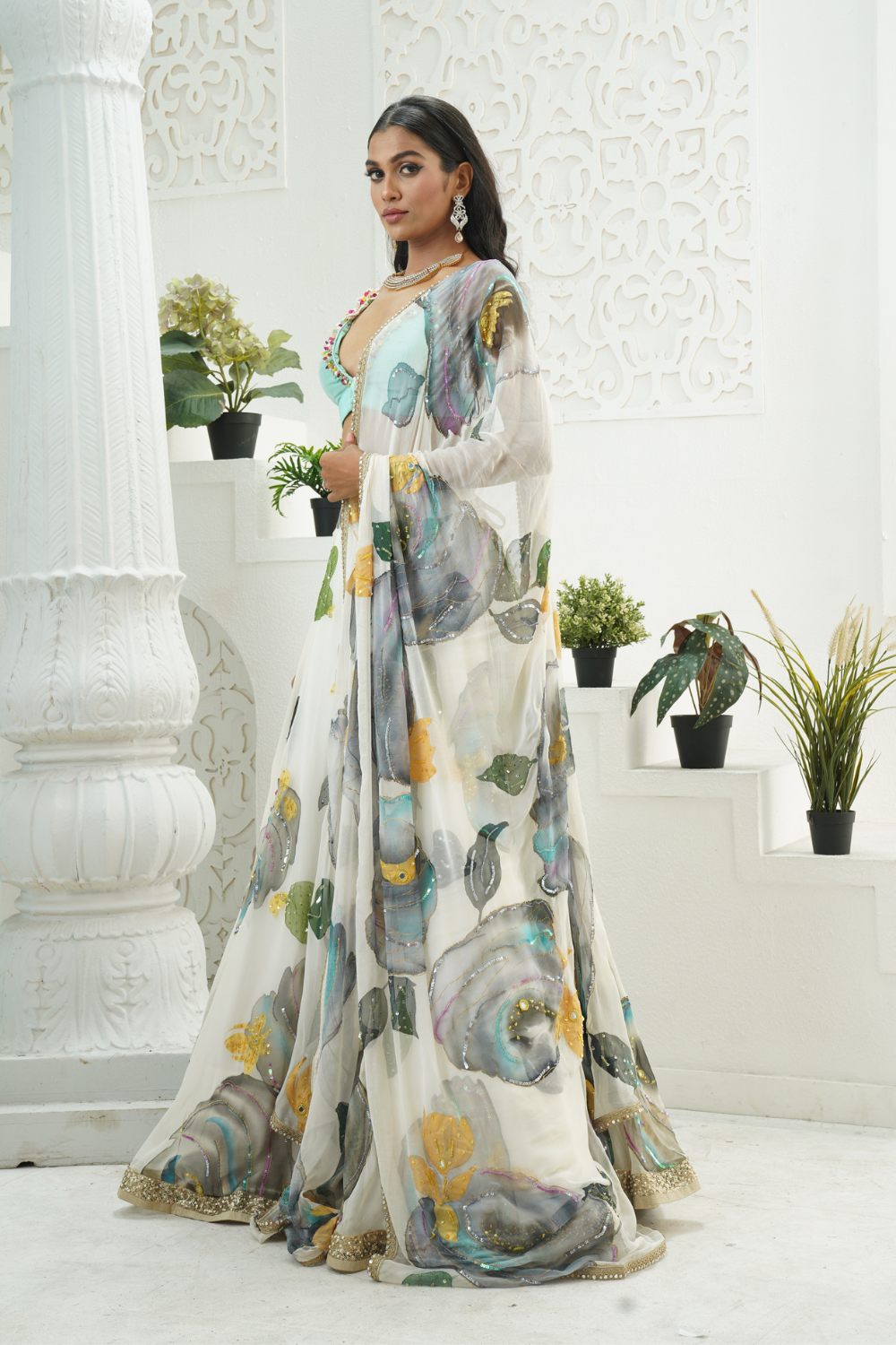 Ivory hand painted lehenga and Mint bralette blouse set