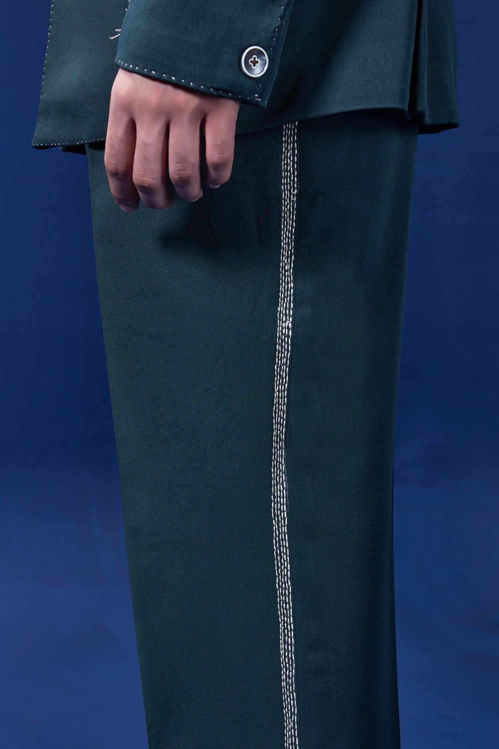 Green blazer detailing with thread work and horse embroidery