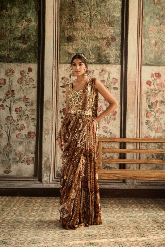 IVORY BUTTA PRINT AND HIGHLIGHTED SQUARE NECK BLOUSE WITH CARAMEL PRINT AND HIGHLIGHTED TIERED SKIRT SAREE SET