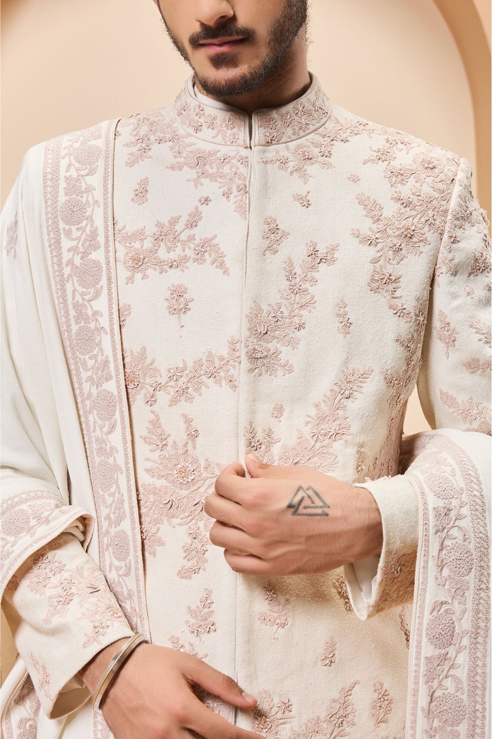 Ivory sherwani detailing with pearl,sequins and thread work