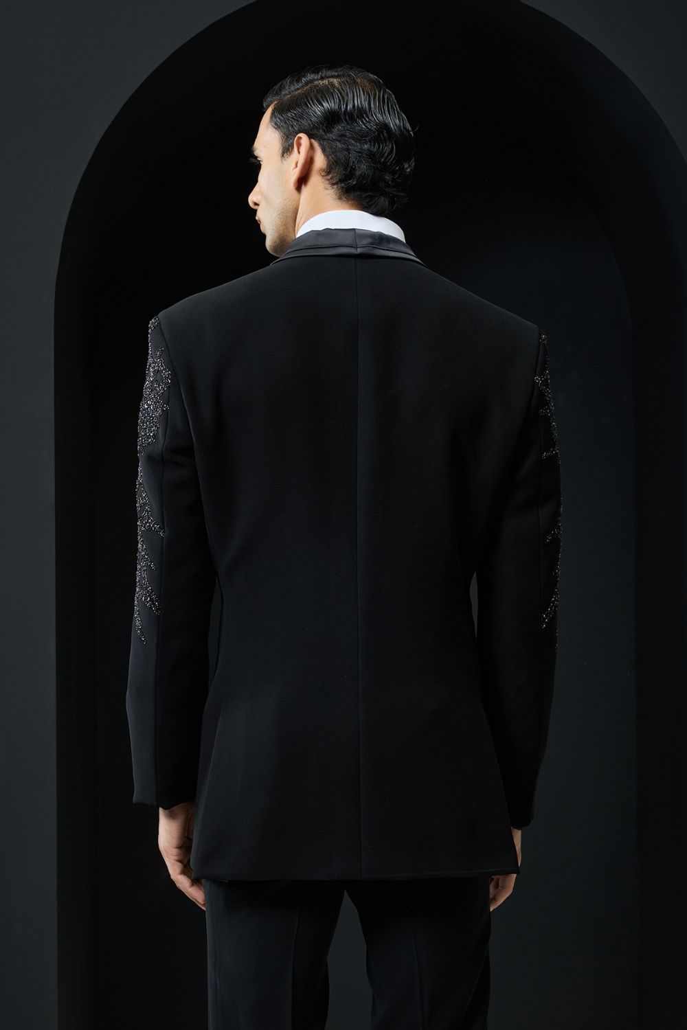 Black tuxedo highlighted with sequins, pearls,cutdana