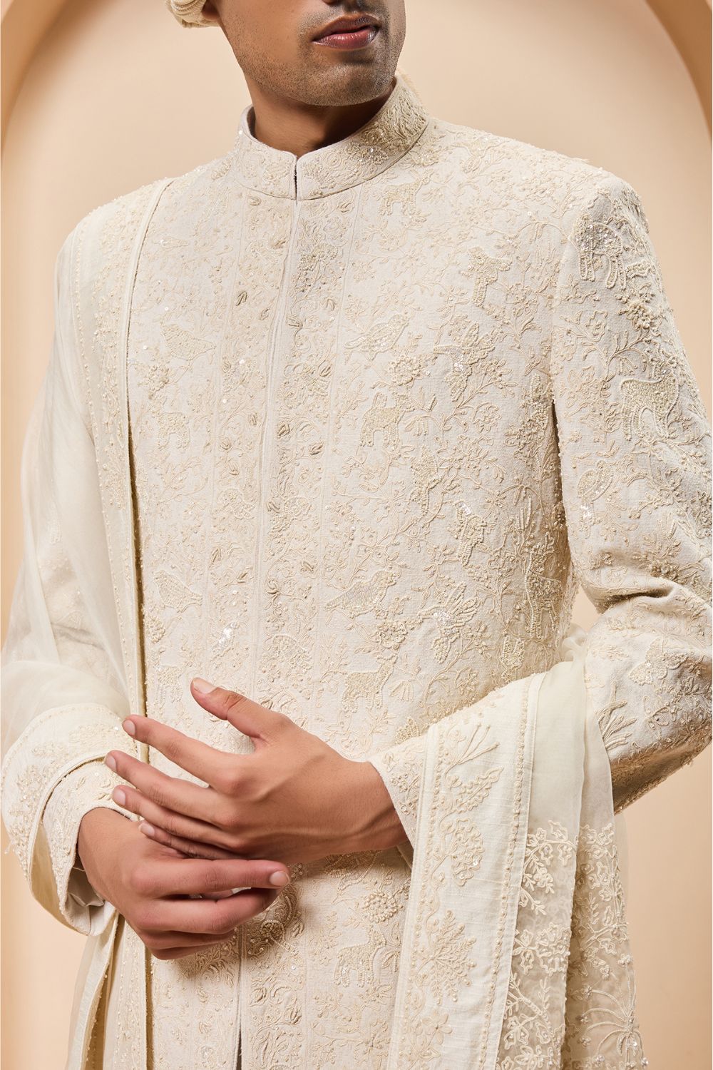 Ivory sherwani detailing with pearl,sequins and thread work