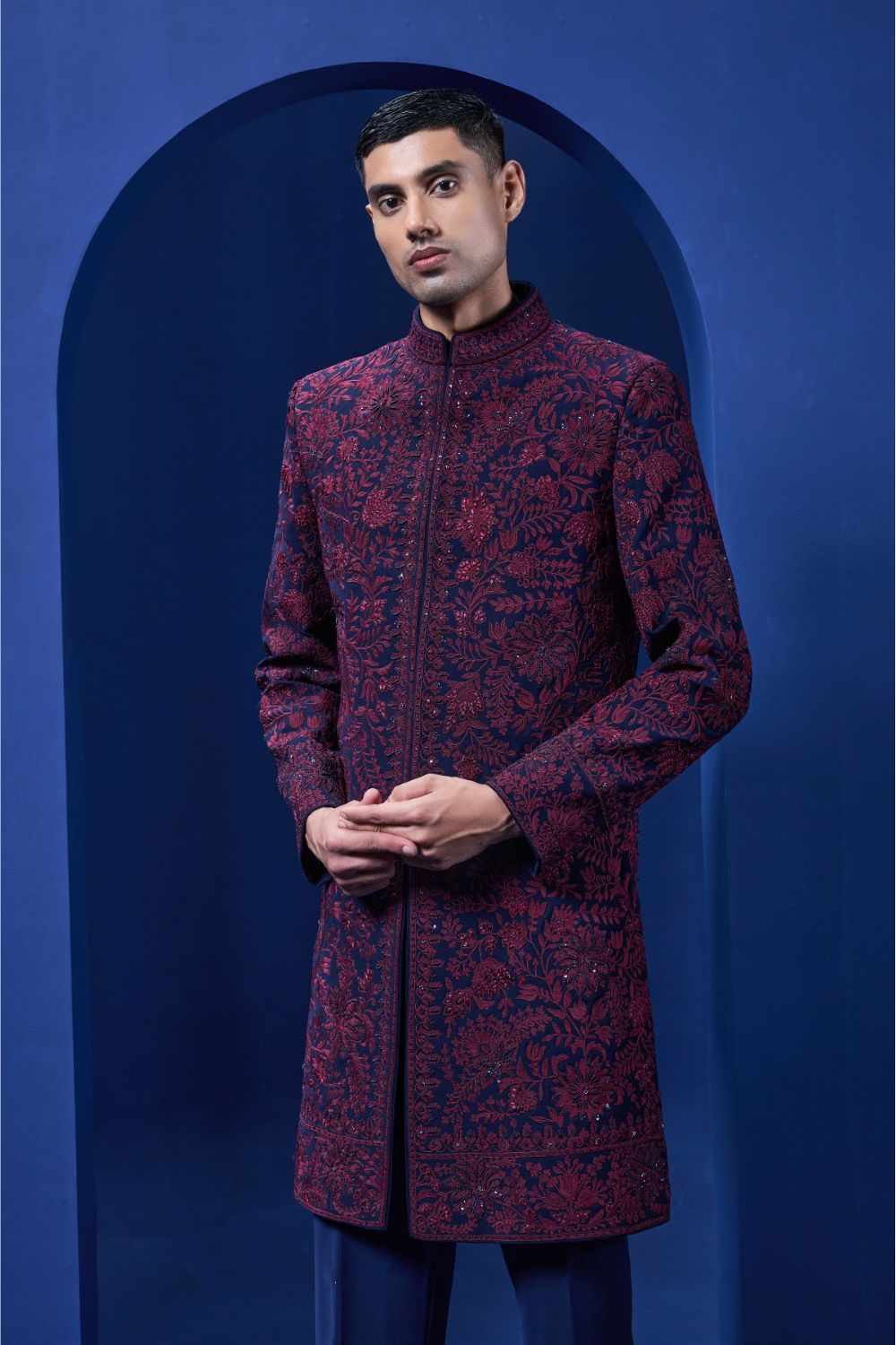 Navy blue Indo Western highlighted with sequins, pearls and wine thread work