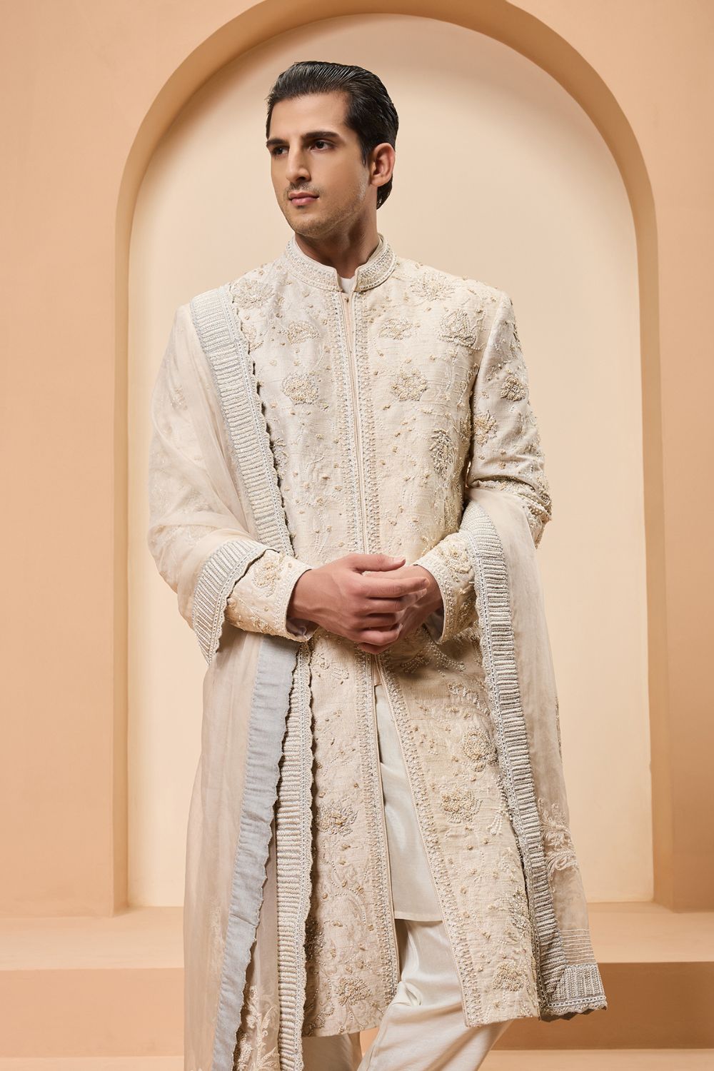 Ivory sherwani detailing with pearl,sequins and thread work