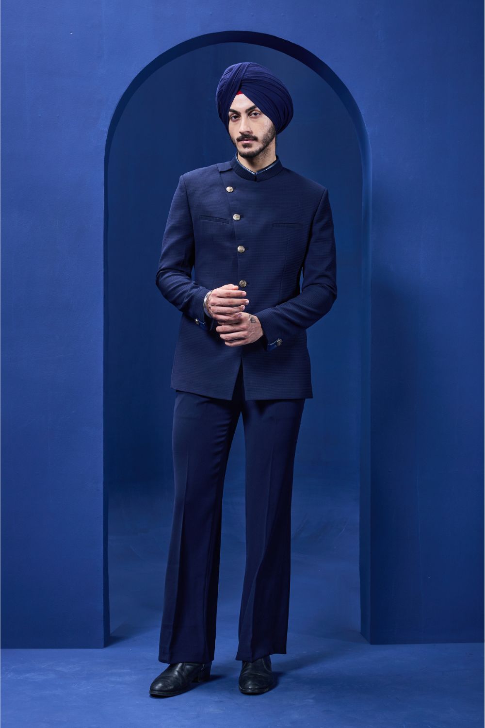 Navy blue bandhgala detailing with golden button satin taping