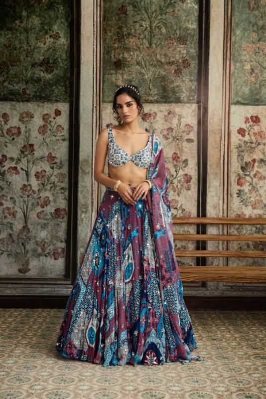 IVORY BUTTA PRINT AND HIGHLIGHTED BLOUSE WITH TEAL PRINT AND HIGHLIGHTED LEHENGA SET