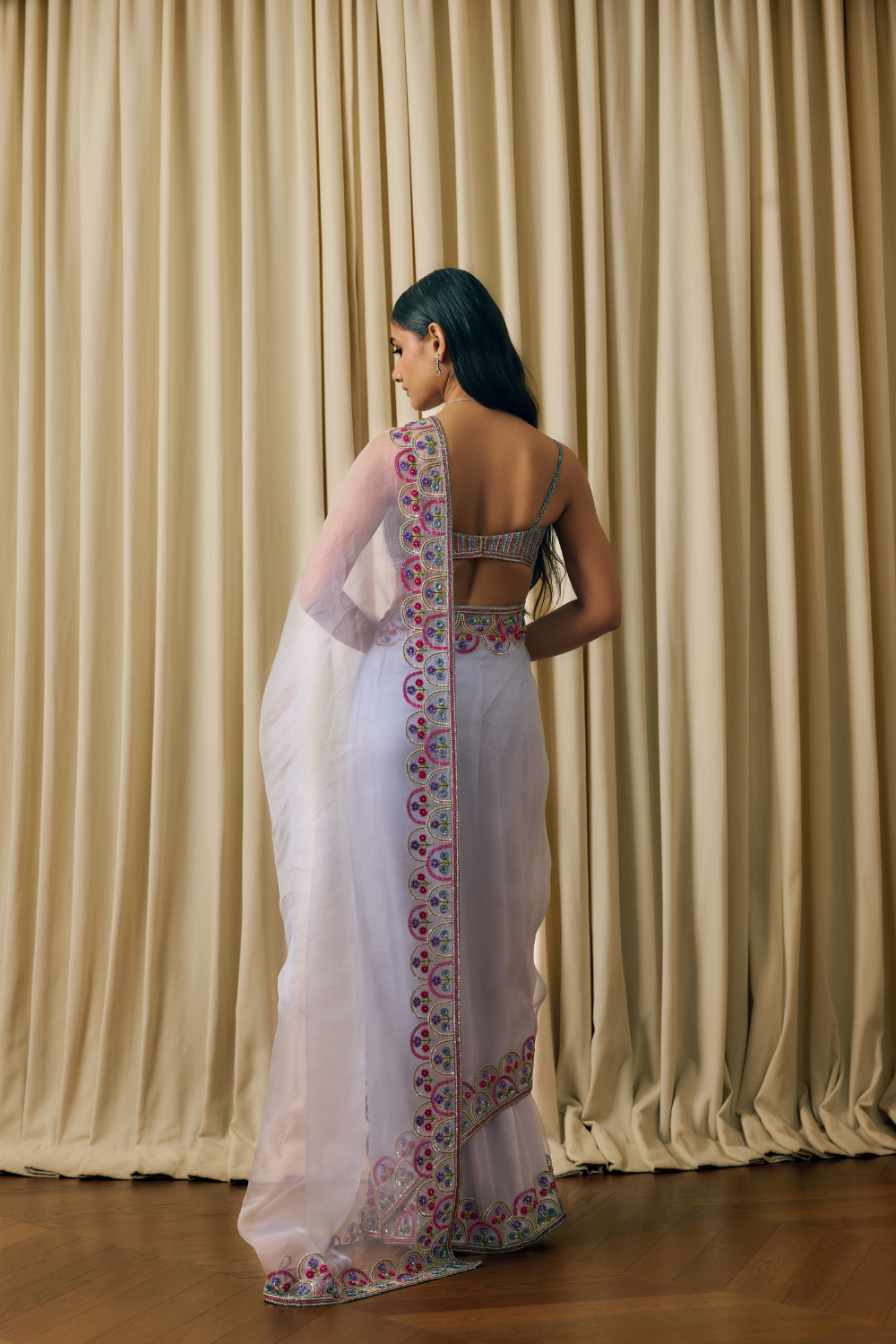 Hand embroidered saree with a sequin blouse