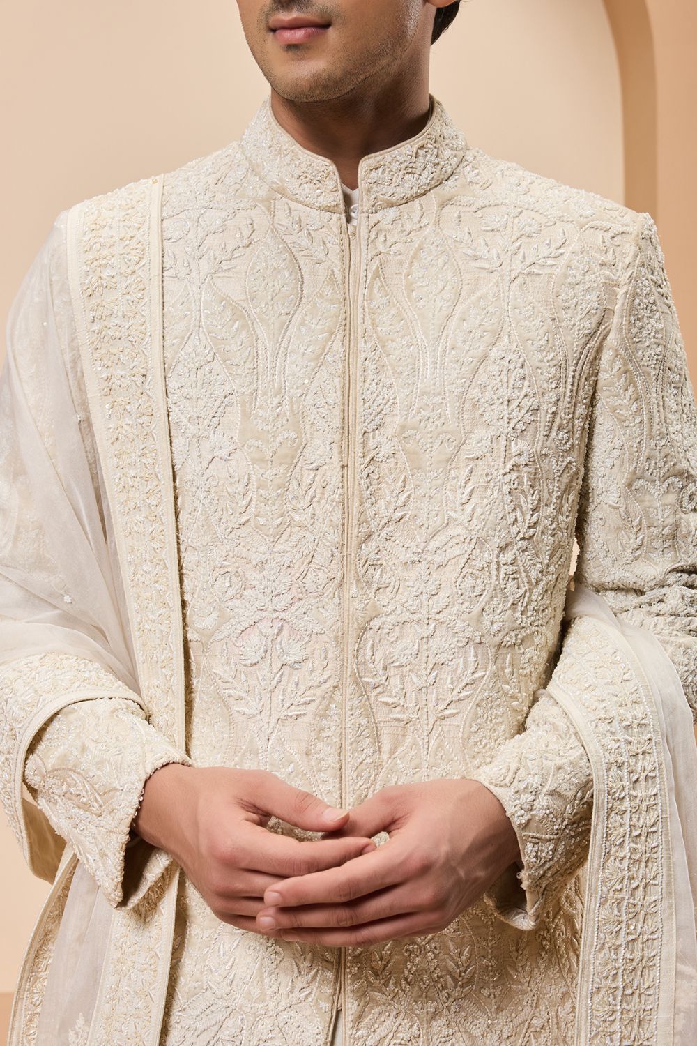 Ivory sherwani detailing with pearl,sequins and aplic work