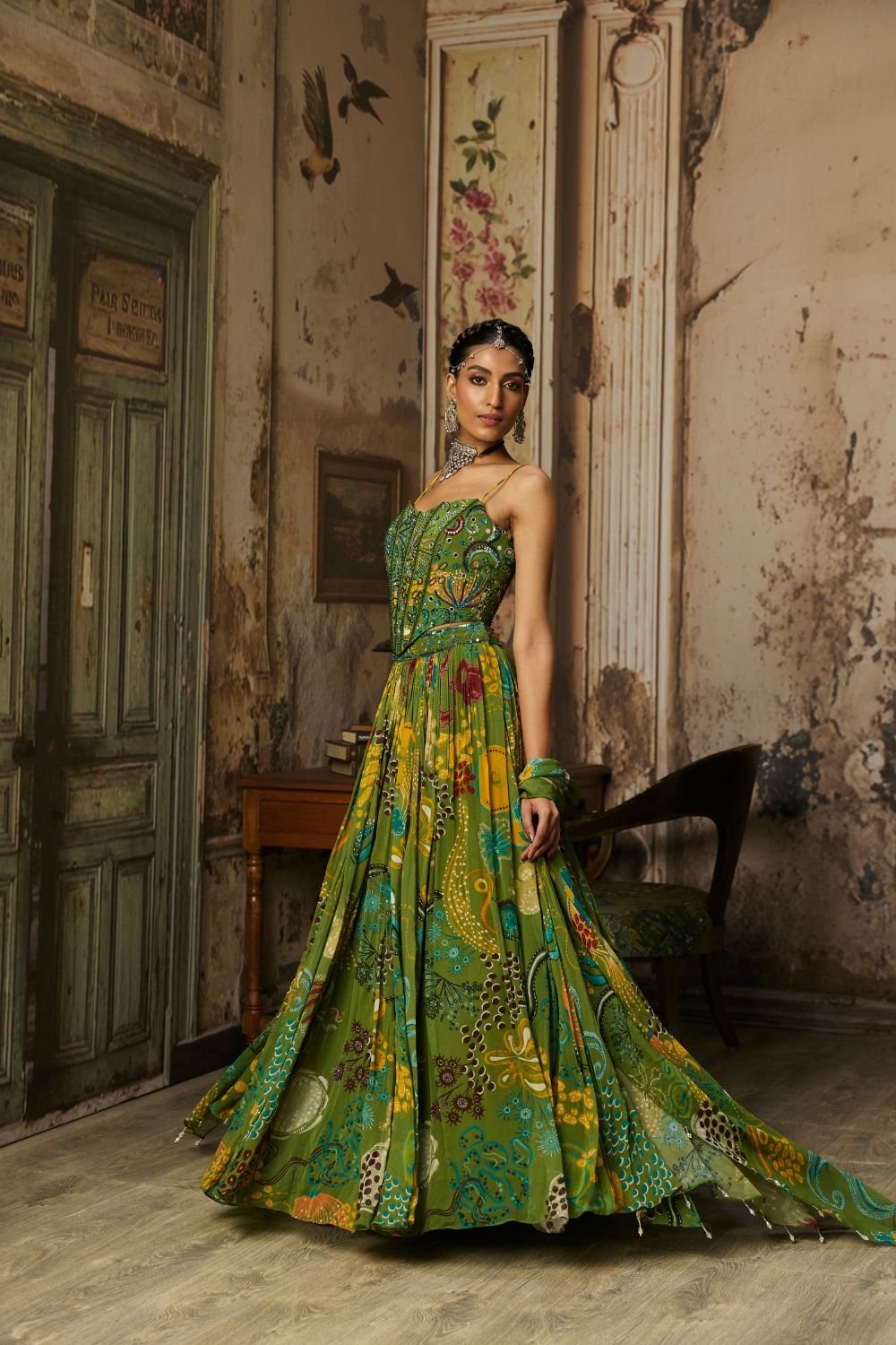 PEAR GREEN PRINTED AND HIGHLIGHTED CORSET LEHENGA SET