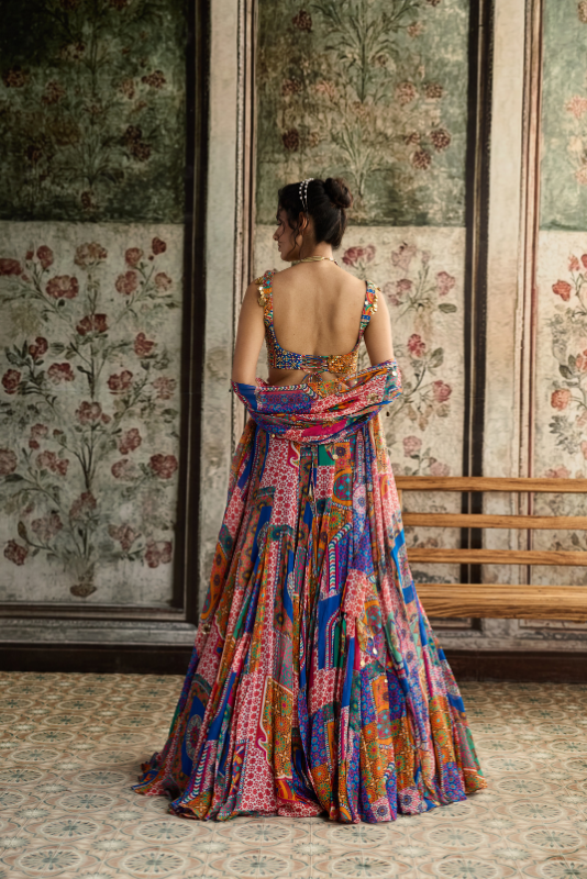 MULTI-COLOR PRINT AND HIGHLIGHTED CRISS-CROSS BACK BLOUSE WITH GODET SKIRT SET